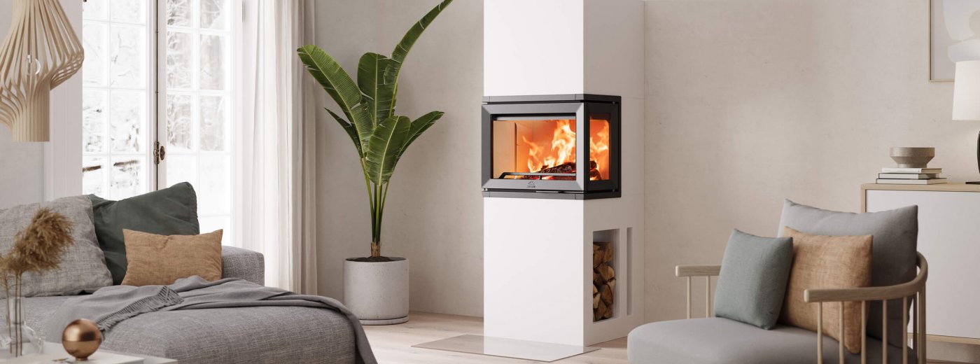 Jøtul FS 520 FRL weißer Kamin in einem hellen modernen skandinavischen Wohnzimmer